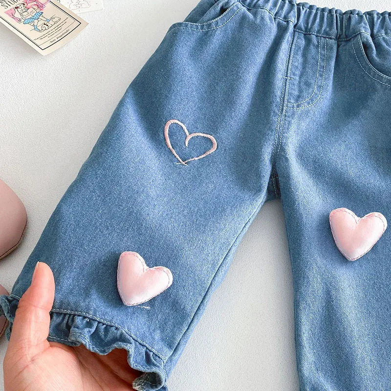Jean style coréen pour filles, nouveau modèle printemps 2025, avec ourlet à volants et décoration cœur, pour filles de 0 à 5 ans, taille élastique, en denim