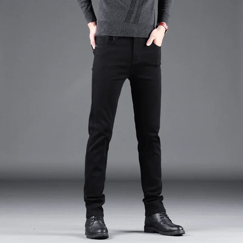 Pantalones vaqueros ajustados negros puros para hombre, pantalones rectos elásticos, moda de negocios, pantalones vaqueros vintage coreanos para hombre, primavera y otoño