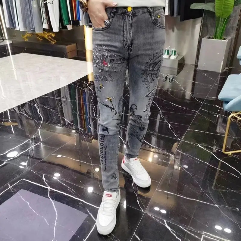 Vaqueros ajustados de alta gama para hombre, de estilo coreano europeo, con estampado de diamantes de tigre, para uso informal, ropa de lujo elástica para primavera y otoño.