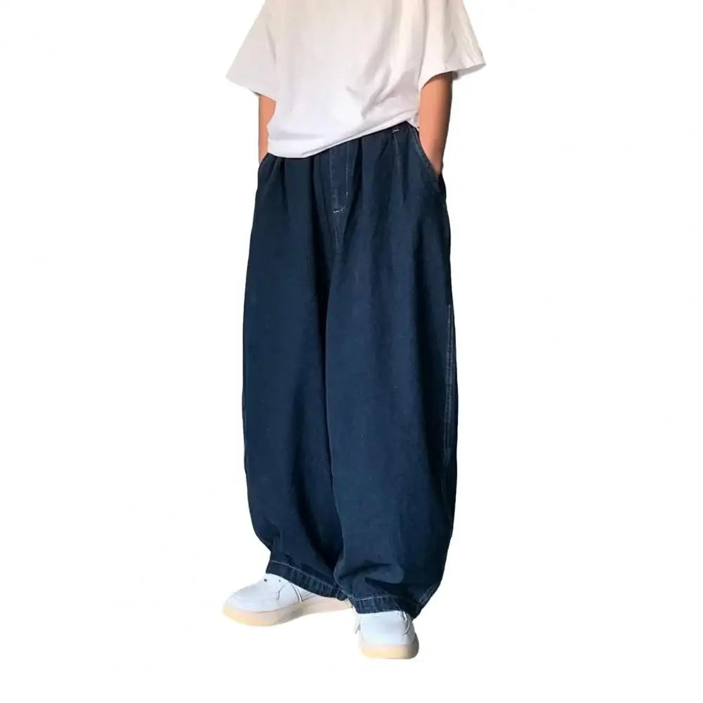 Pantalones vaqueros de tiro medio para hombre, cintura elástica, bolsillos, color liso, holgados, pierna ancha, ropa de calle