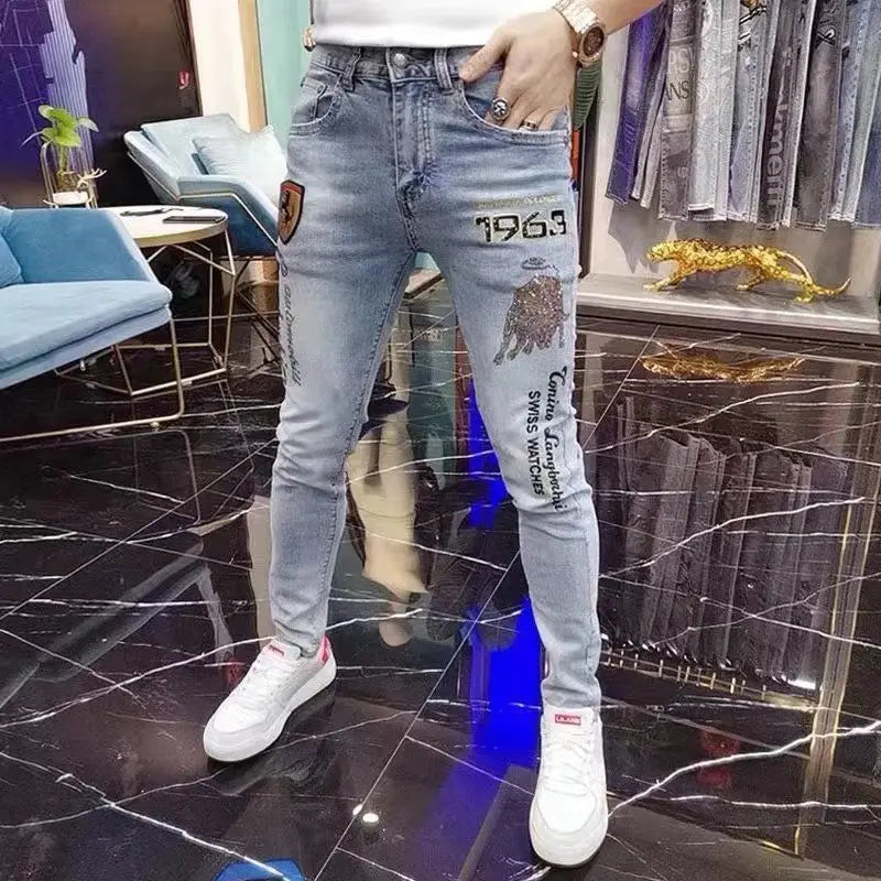 Vaqueros ajustados de alta gama para hombre, de estilo coreano europeo, con estampado de diamantes de tigre, para uso informal, ropa de lujo elástica para primavera y otoño.