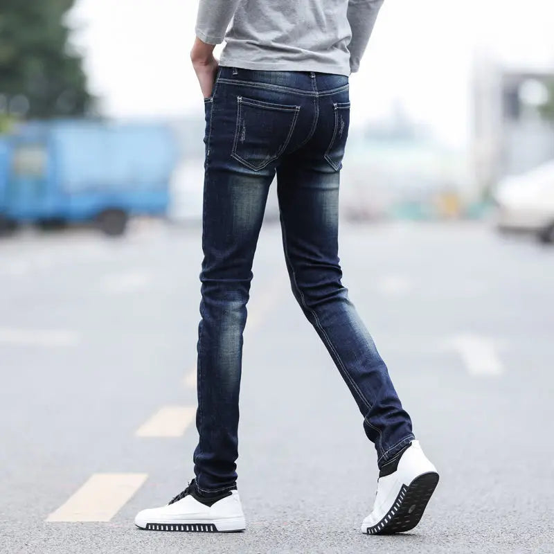 Pantalones vaqueros de diseño de primavera y otoño para hombre, estilo coreano, estilo boy friend, de algodón, elásticos, ajustados e informales.
