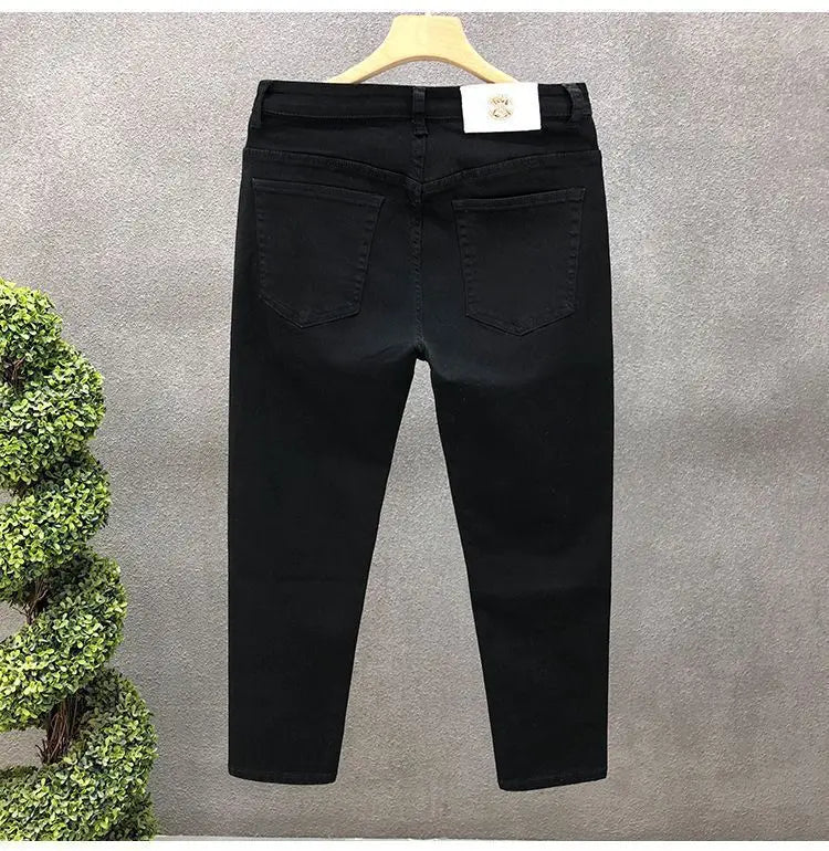 Vaqueros ajustados de estilo coreano de alta calidad para hombre, de estilo urbano, para primavera y otoño, con tela vaquera y pantalones casuales punk en blanco y negro liso.
