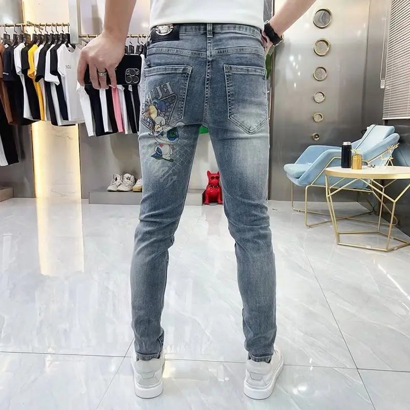 Vaqueros ajustados de alta gama para hombre, de estilo coreano europeo, con estampado de diamantes de tigre, para uso informal, ropa de lujo elástica para primavera y otoño.