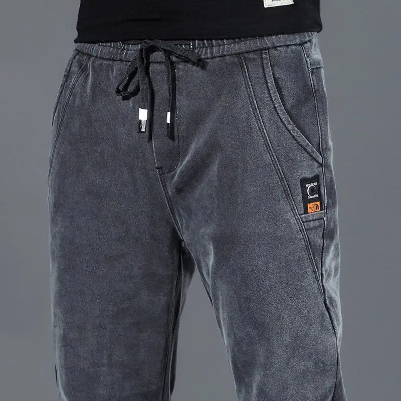 Pantalones vaqueros de mezclilla para primavera y otoño, cintura elástica, finos, con cordón, ajustados, para adolescentes, estudiantes, informales, de diseñador, para hombre, 2022