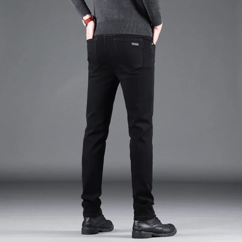 Pantalones vaqueros ajustados negros puros para hombre, pantalones rectos elásticos, moda de negocios, pantalones vaqueros vintage coreanos para hombre, primavera y otoño