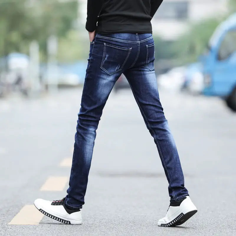 Pantalones vaqueros de diseño de primavera y otoño para hombre, estilo coreano, estilo boy friend, de algodón, elásticos, ajustados e informales.