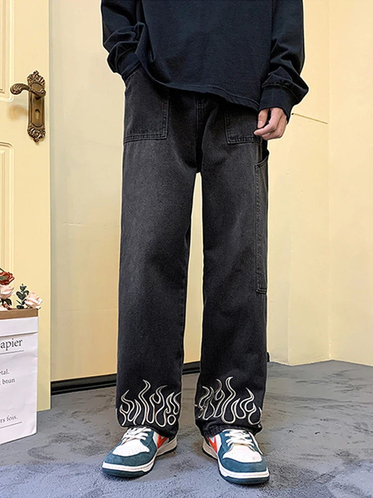 Pantalones vaqueros vintage con estampado de llamas Y2K para hombre, pantalones vaqueros holgados de pierna ancha, pantalones vaqueros rectos de moda hip hop 2025.