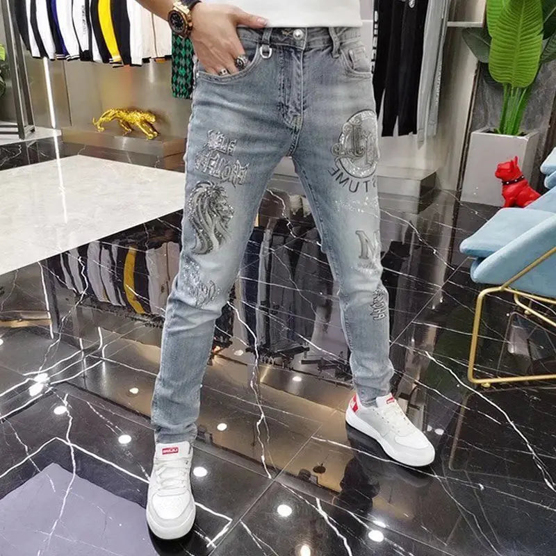 Vaqueros ajustados de alta gama para hombre, de estilo coreano europeo, con estampado de diamantes de tigre, para uso informal, ropa de lujo elástica para primavera y otoño.
