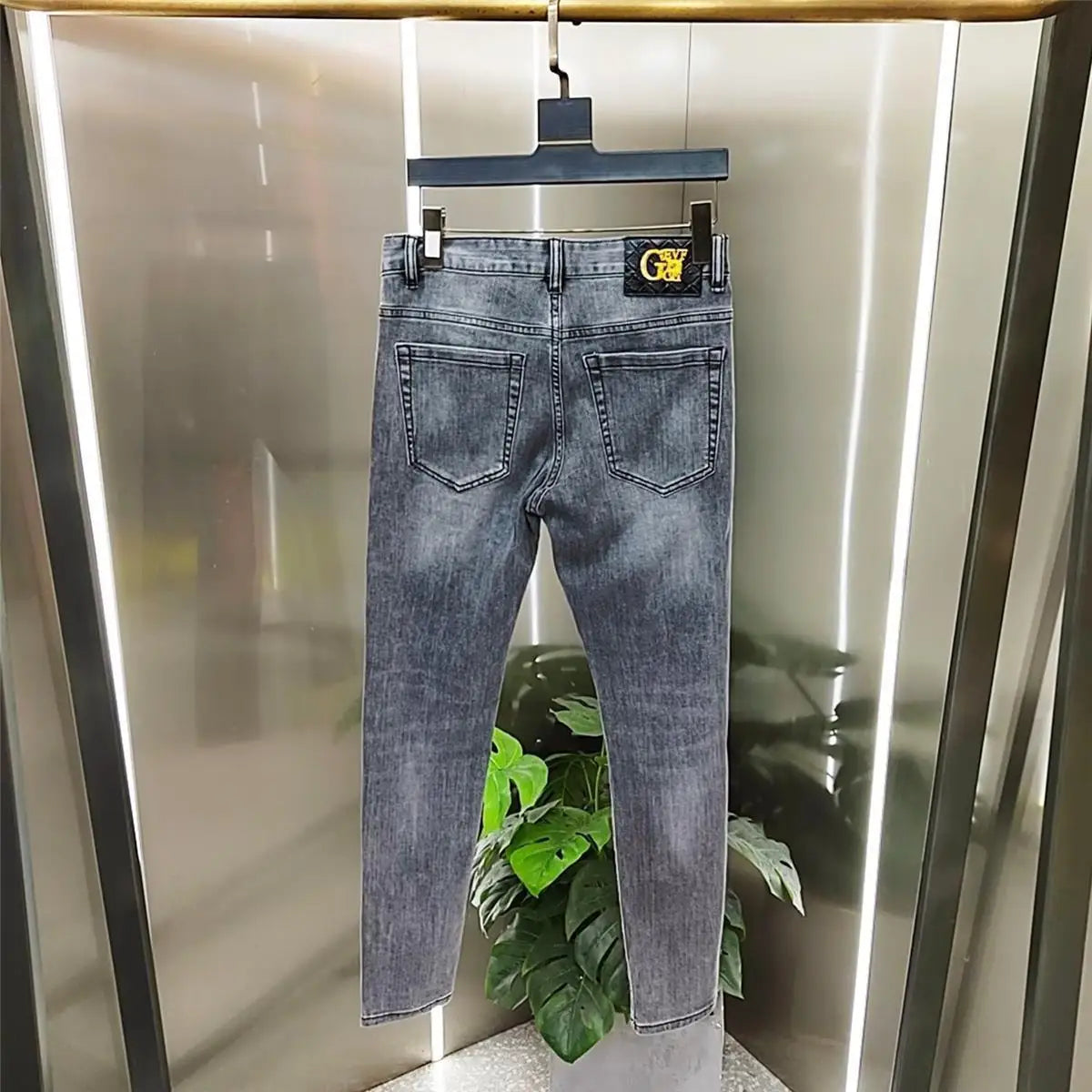 Vaqueros ajustados de alta gama para hombre, de estilo coreano europeo, con estampado de diamantes de tigre, para uso informal, ropa de lujo elástica para primavera y otoño.