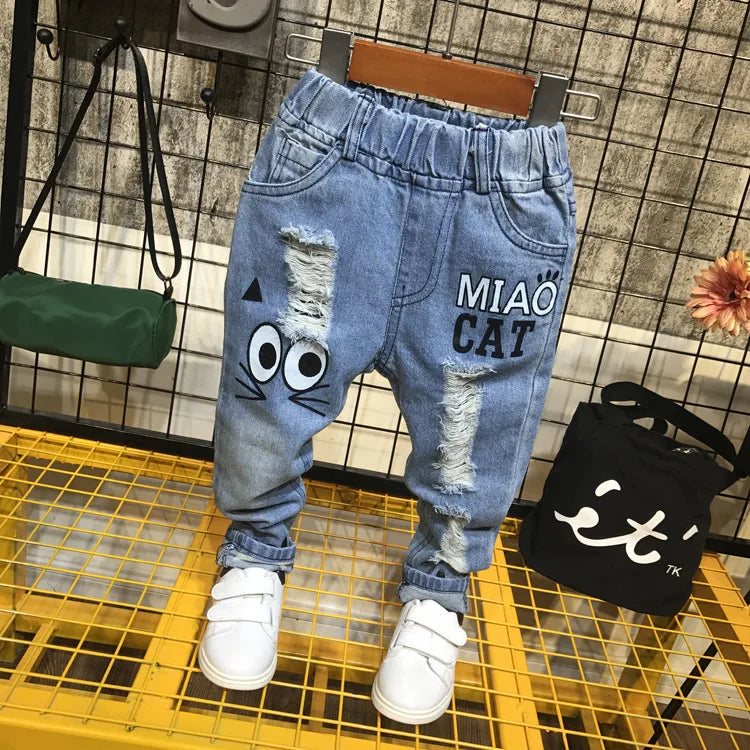 Pantalones vaqueros para niñas de 1 a 7 años, informales, con agujeros y estampado de gato de dibujos animados, para primavera y otoño