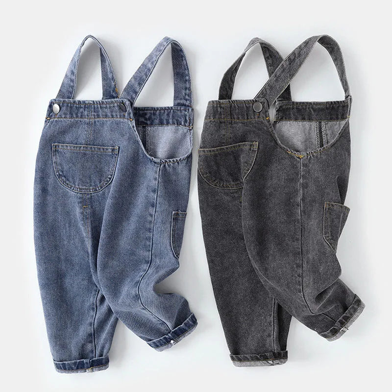 Monos informales holgados de primavera y otoño para niños, pantalones vaqueros de color liso para niños y niñas, monos vaqueros de moda para bebés.