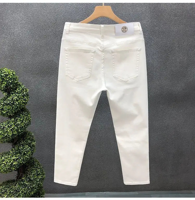 Vaqueros ajustados de estilo coreano de alta calidad para hombre, de estilo urbano, para primavera y otoño, con tela vaquera y pantalones casuales punk en blanco y negro liso.