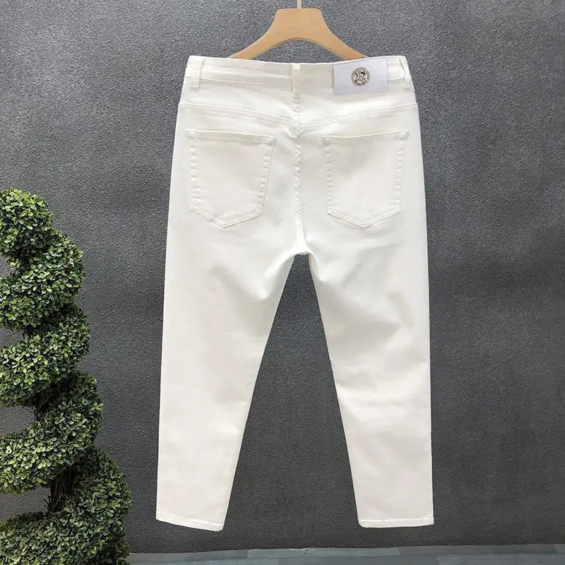 Vaqueros ajustados de estilo coreano de alta calidad para hombre, de estilo urbano, para primavera y otoño, con tela vaquera y pantalones casuales punk en blanco y negro liso.