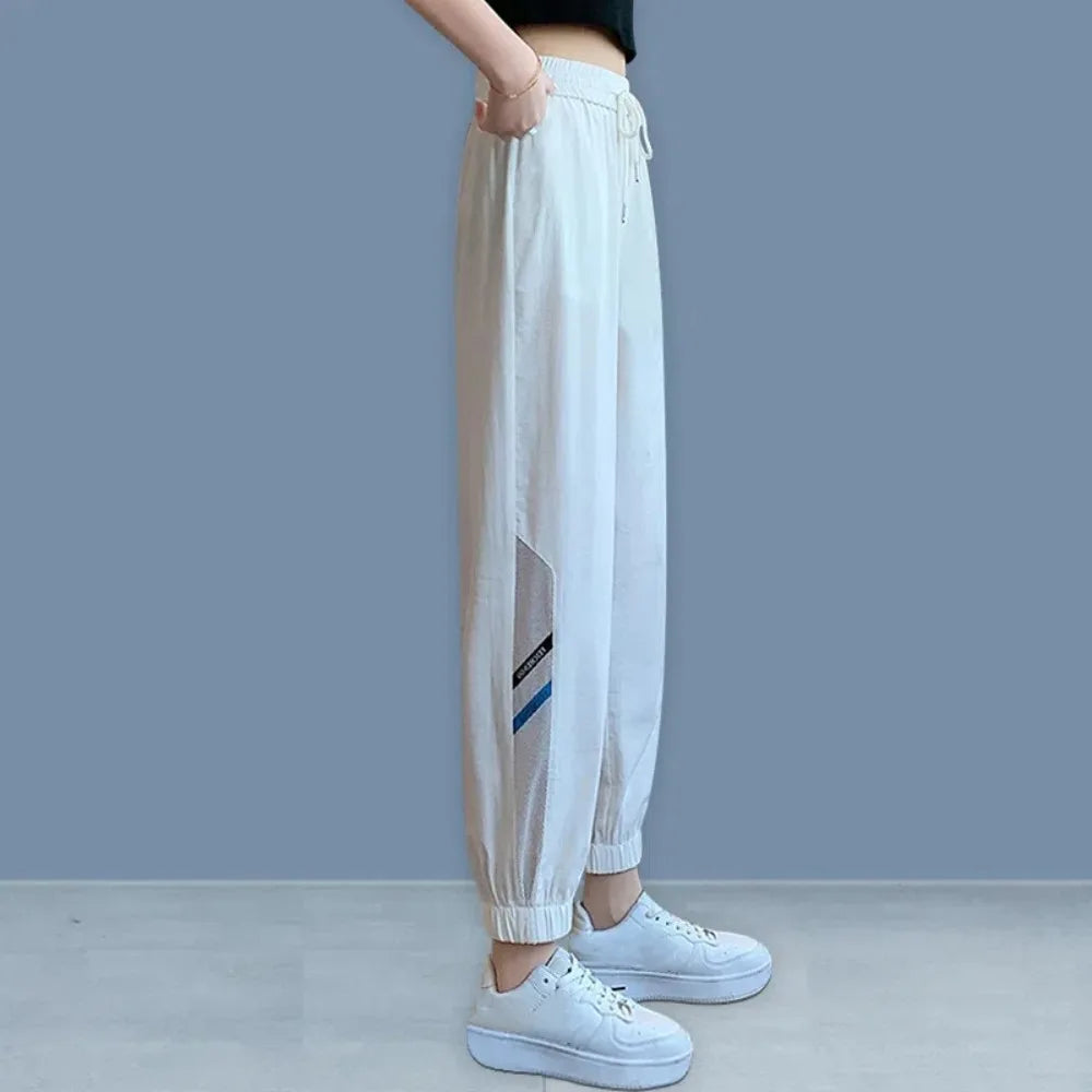 Pantalones casuales rectos y delgados con cordón de malla para mujer