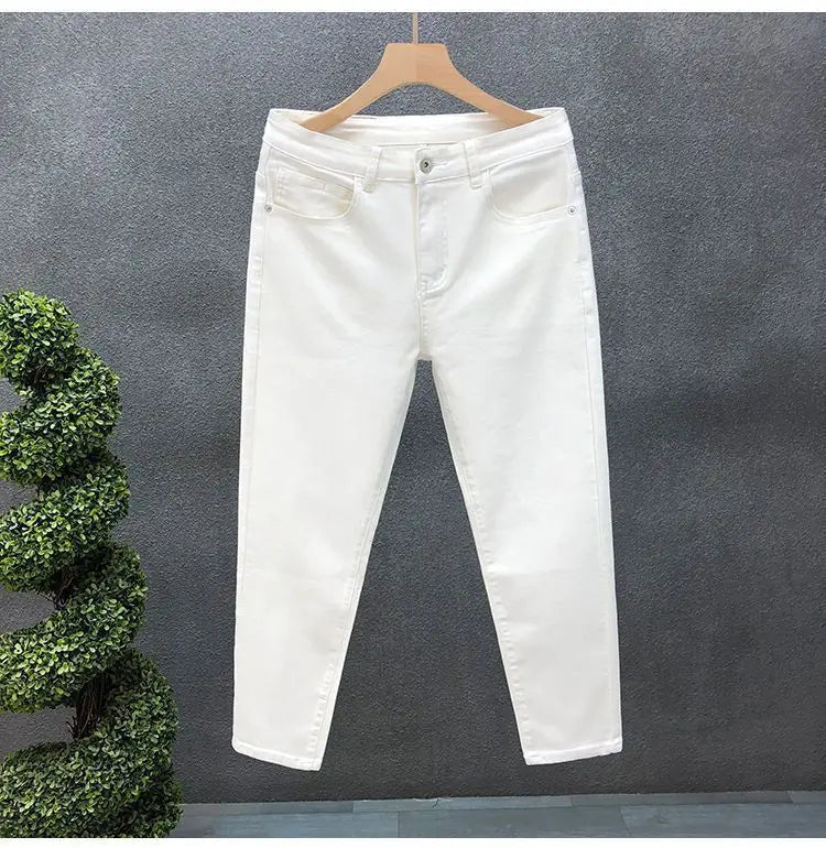 Vaqueros ajustados de estilo coreano de alta calidad para hombre, de estilo urbano, para primavera y otoño, con tela vaquera y pantalones casuales punk en blanco y negro liso.