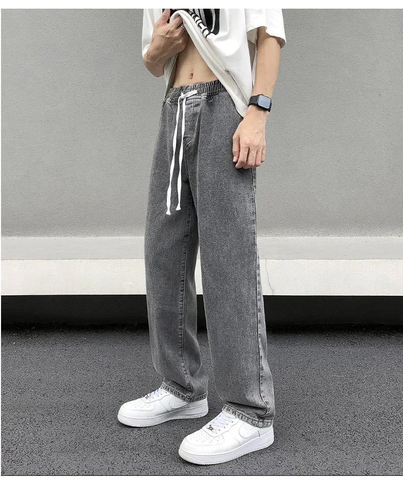 Pantalones vaqueros casuales de pierna recta para hombre, primavera, nuevos, holgados, con cintura elástica, estilo americano, pantalones de pierna ancha, recién llegados, moda de calle.