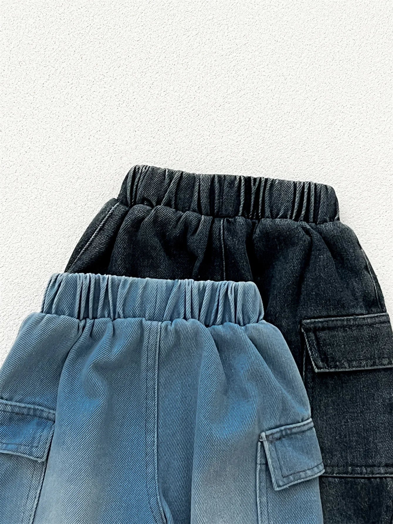 Pantalones vaqueros holgados para niños, pantalones cargo lisos con bolsillos, informales, versátiles, ropa de bebé, primavera 2025