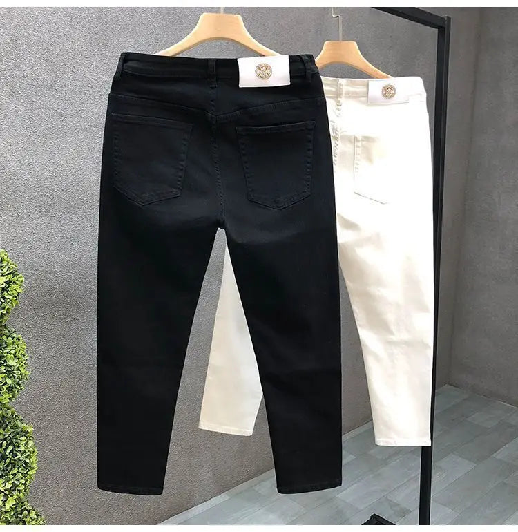 Vaqueros ajustados de estilo coreano de alta calidad para hombre, de estilo urbano, para primavera y otoño, con tela vaquera y pantalones casuales punk en blanco y negro liso.