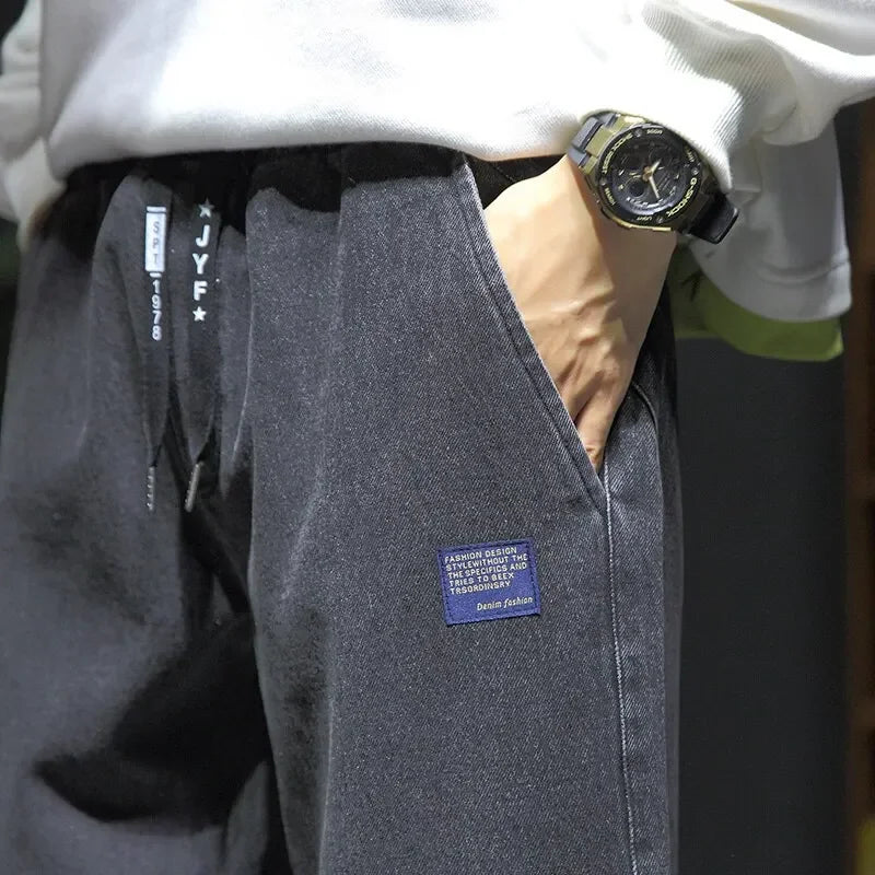 Nuevo estilo primavera verano negro azul cargo jeans hombres streetwear pantalones vaqueros jogger masculino holgado harem jeans talla grande M-8XL