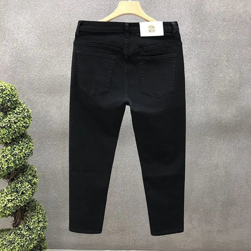 Vaqueros ajustados de estilo coreano de alta calidad para hombre, de estilo urbano, para primavera y otoño, con tela vaquera y pantalones casuales punk en blanco y negro liso.