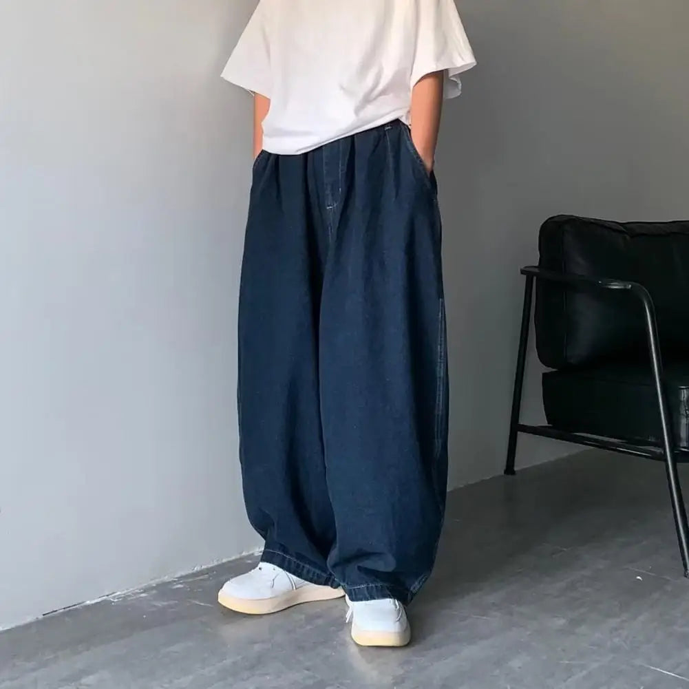 Pantalones vaqueros de tiro medio para hombre, cintura elástica, bolsillos, color liso, holgados, pierna ancha, ropa de calle