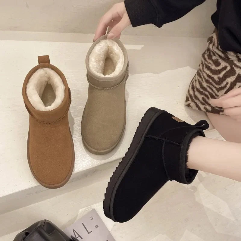 Nuevas botas de nieve estilo mini botas de invierno de piel de oveja para mujer, botines impermeables de lana natural con forro de piel, zapatos planos cálidos hasta el tobillo