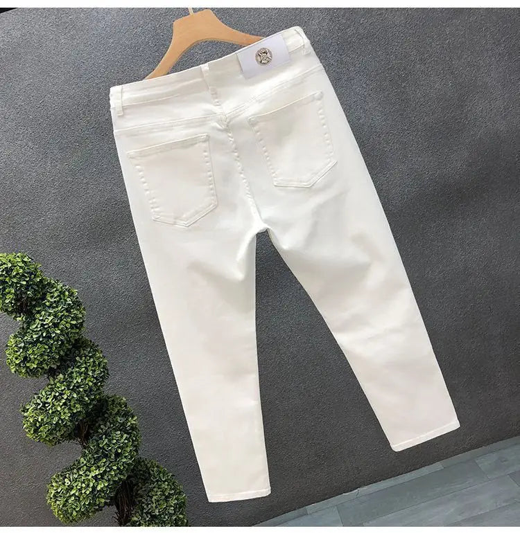 Vaqueros ajustados de estilo coreano de alta calidad para hombre, de estilo urbano, para primavera y otoño, con tela vaquera y pantalones casuales punk en blanco y negro liso.