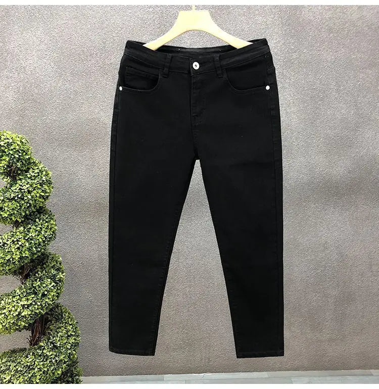 Vaqueros ajustados de estilo coreano de alta calidad para hombre, de estilo urbano, para primavera y otoño, con tela vaquera y pantalones casuales punk en blanco y negro liso.