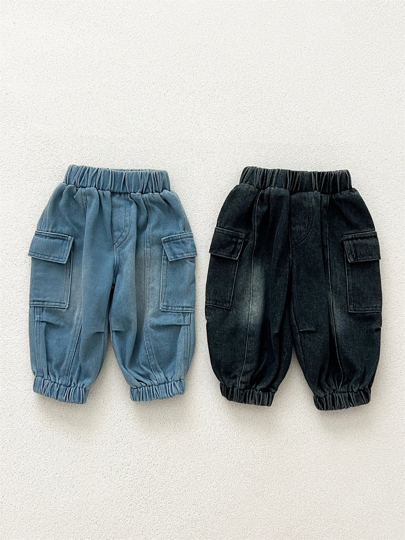 Pantalones vaqueros holgados para niños, pantalones cargo lisos con bolsillos, informales, versátiles, ropa de bebé, primavera 2025